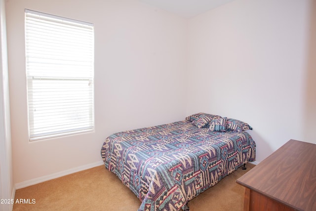 7413 E Russet Sky Dr, Scottsdale, AZ 85266 - carpeted bedroom featuring multiple windows and baseboards