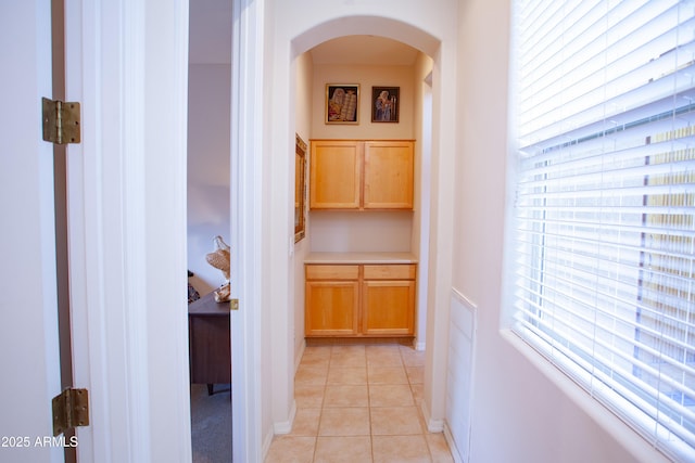 7413 E Russet Sky Dr, Scottsdale, AZ 85266 - corridor featuring arched walkways and light tile patterned floors