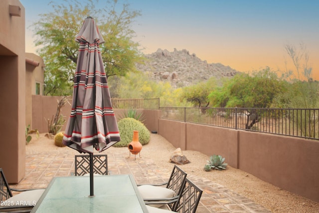 7413 E Russet Sky Dr, Scottsdale, AZ 85266 - fenced backyard with outdoor dining space, a patio area, and a mountain view