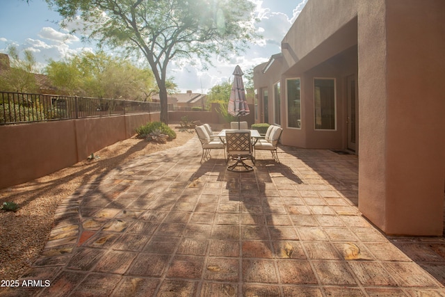 7413 E Russet Sky Dr, Scottsdale, AZ 85266 - fenced backyard featuring outdoor dining space and a patio
