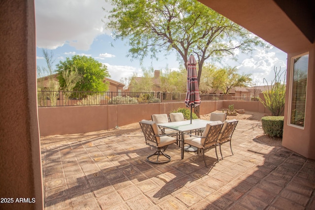 7413 E Russet Sky Dr, Scottsdale, AZ 85266 - fenced backyard featuring outdoor dining area and a patio