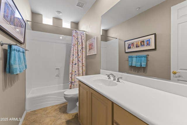 full bathroom featuring tile patterned flooring, vanity, shower / tub combo, and toilet