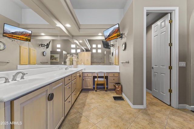 bathroom with vanity and tile patterned flooring