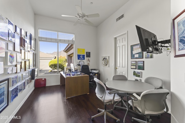 office area with ceiling fan and dark hardwood / wood-style flooring