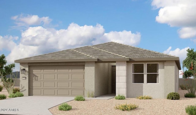 view of front of home with a garage