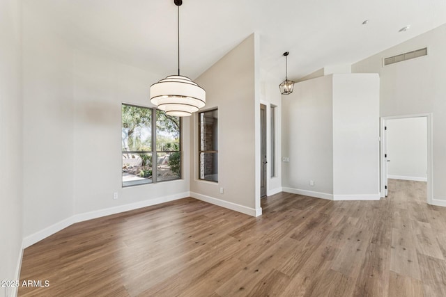 11008 N 119th Pl, Scottsdale, AZ 85259 - unfurnished room featuring wood finished floors and high vaulted ceiling