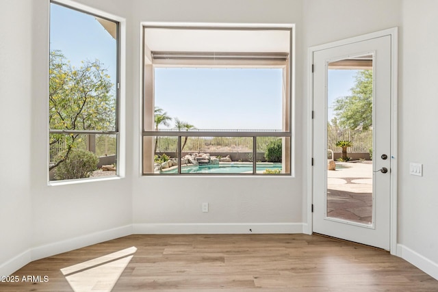 11008 N 119th Pl, Scottsdale, AZ 85259 - doorway to outside featuring wood finished floors