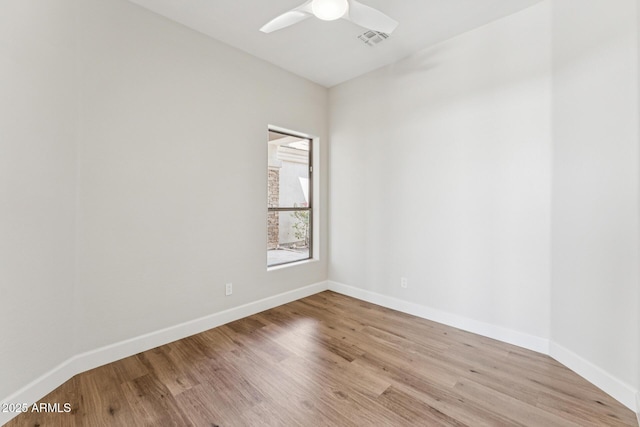 11008 N 119th Pl, Scottsdale, AZ 85259 - unfurnished room with wood finished floors and ceiling fan