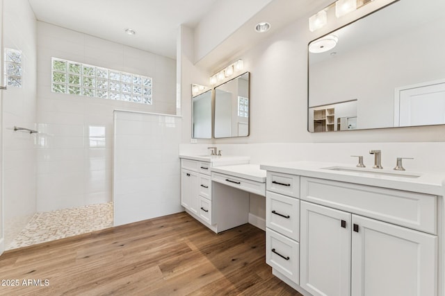 11008 N 119th Pl, Scottsdale, AZ 85259 - bathroom featuring double vanity, walk in shower, wood finished floors, and recessed lighting