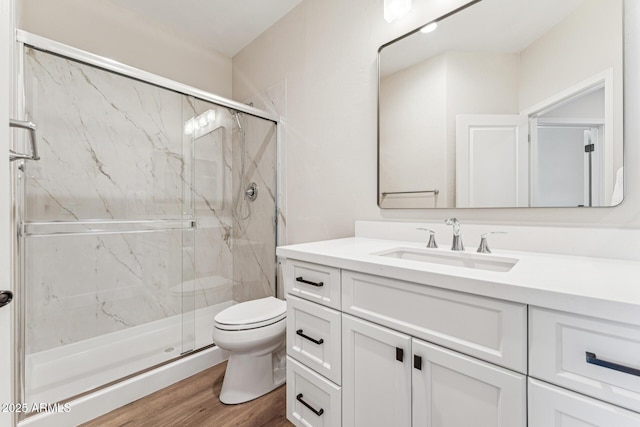 11008 N 119th Pl, Scottsdale, AZ 85259 - bathroom featuring vanity, a marble finish shower, and wood finished floors