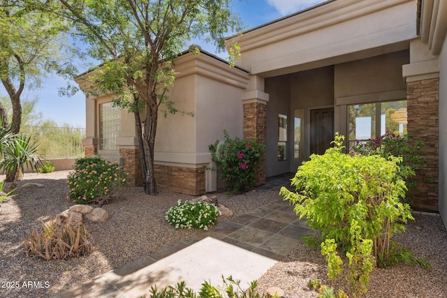 11008 N 119th Pl, Scottsdale, AZ 85259 - doorway to property featuring stone siding and stucco siding