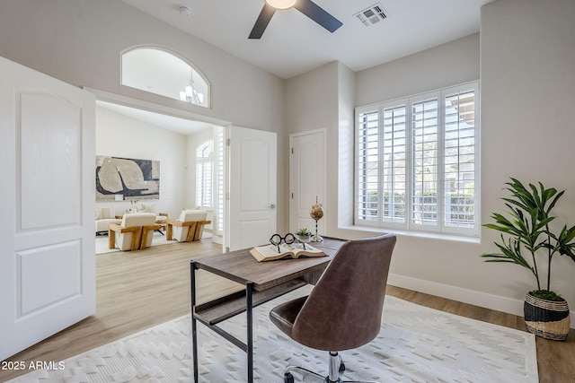 home office featuring ceiling fan and light wood-type flooring