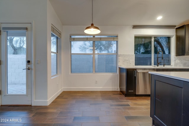 2203 E Crest Ln, Phoenix, AZ 85024 - kitchen featuring dishwasher, light countertops, dark wood finished floors, pendant lighting, and recessed lighting