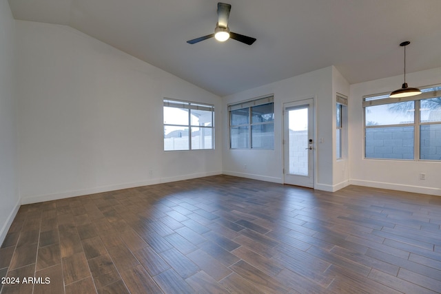 2203 E Crest Ln, Phoenix, AZ 85024 - empty room with lofted ceiling, ceiling fan, dark wood-style flooring, and healthy amount of natural light