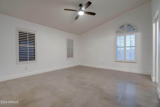 2203 E Crest Ln, Phoenix, AZ 85024 - empty room with lofted ceiling, concrete flooring, and a ceiling fan