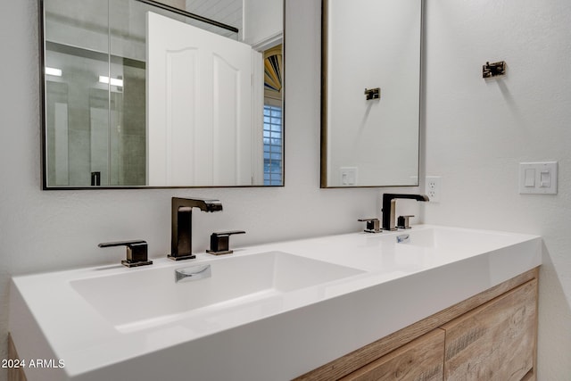 2203 E Crest Ln, Phoenix, AZ 85024 - bathroom featuring double vanity and a shower with shower door