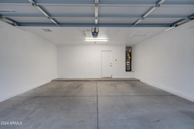 2203 E Crest Ln, Phoenix, AZ 85024 - garage featuring water heater and a garage door opener
