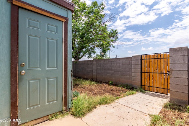 view of yard with a gate and fence