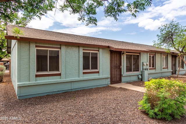 view of front of house featuring stucco siding