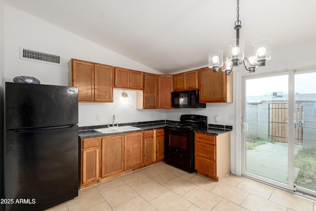 kitchen featuring a sink, black appliances, vaulted ceiling, a chandelier, and dark countertops