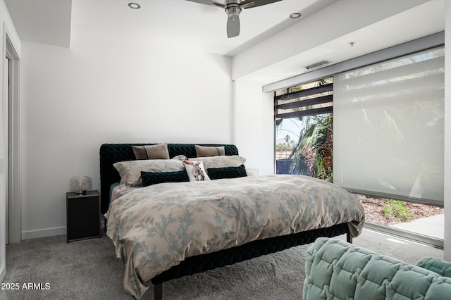 bedroom with baseboards, carpet, a ceiling fan, and visible vents