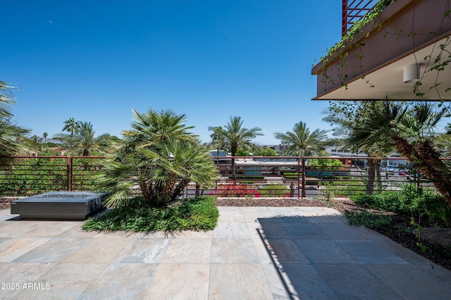 view of patio / terrace featuring fence