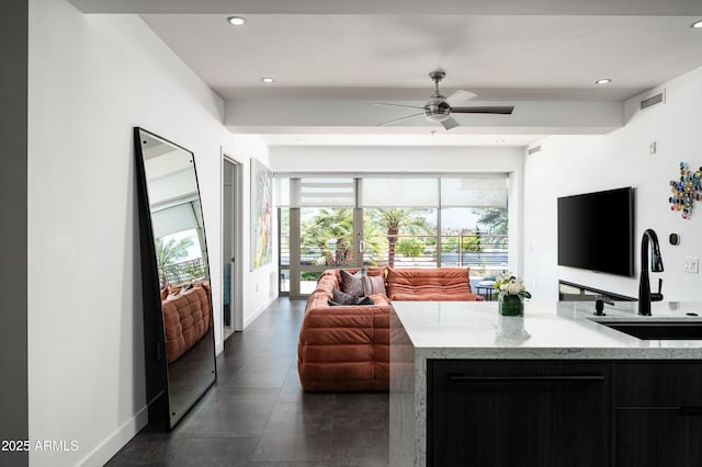 living room featuring recessed lighting, ceiling fan, visible vents, and baseboards
