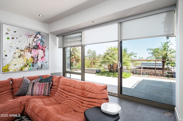 living room featuring visible vents