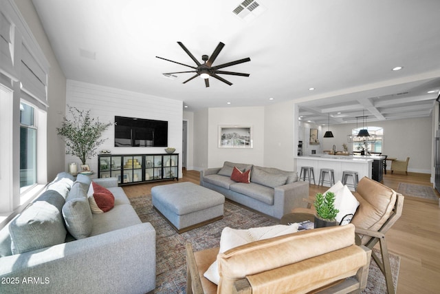 3173 E Page Ave, Gilbert, AZ 85234 - living area featuring light wood-style floors, a ceiling fan, visible vents, recessed lighting, and coffered ceiling