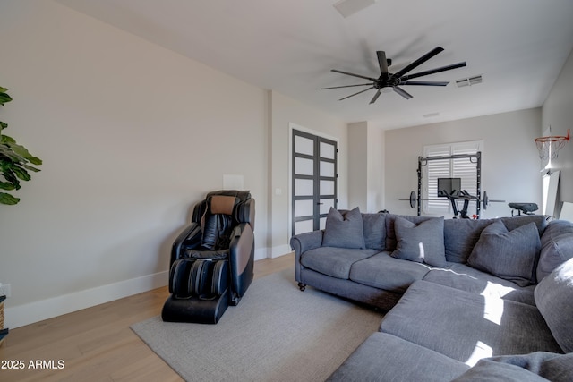 3173 E Page Ave, Gilbert, AZ 85234 - living room with wood finished floors, baseboards, a ceiling fan, and visible vents