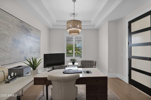 3173 E Page Ave, Gilbert, AZ 85234 - office area with an inviting chandelier, visible vents, wood finished floors, a raised ceiling, and baseboards