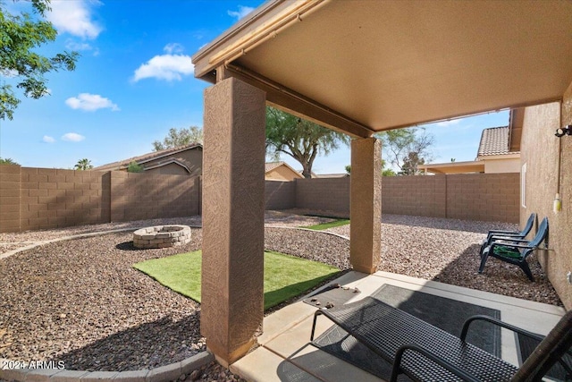 view of patio featuring an outdoor fire pit