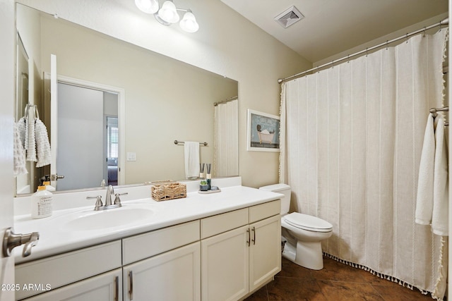 full bathroom with toilet, tile patterned flooring, vanity, and visible vents