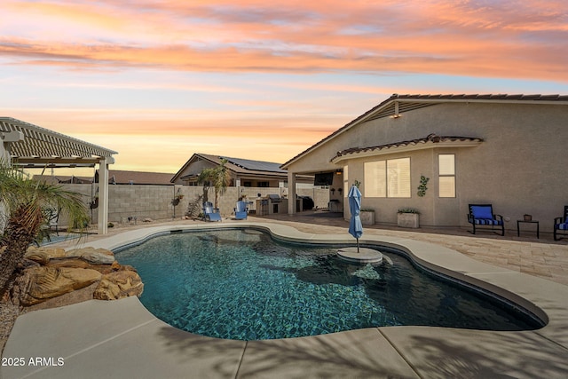 view of swimming pool featuring a fenced in pool, a patio area, a fenced backyard, and a pergola