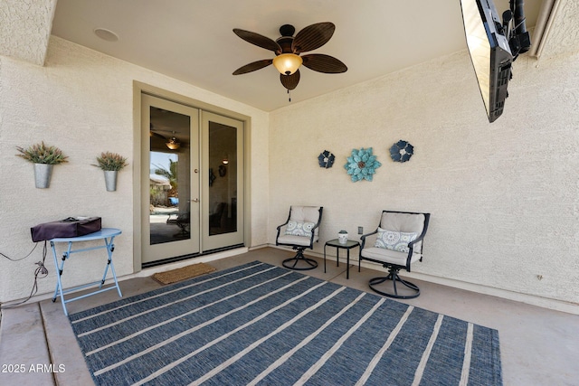 view of patio featuring ceiling fan and french doors