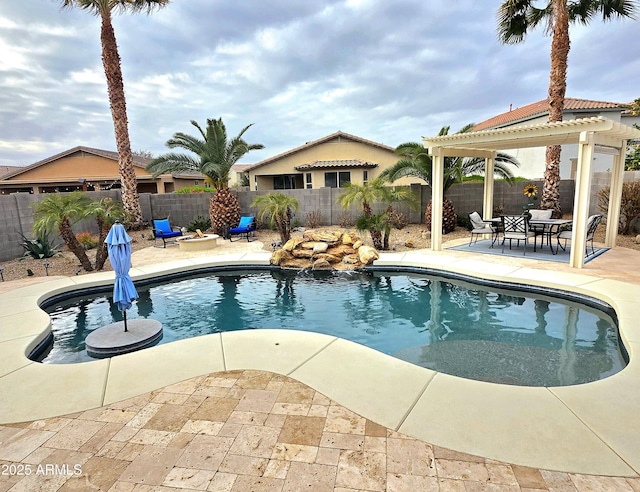 view of swimming pool featuring a fenced backyard, a pergola, and a patio