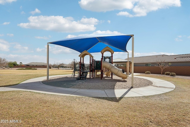 community play area with a lawn