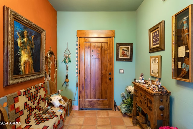 entryway featuring light tile patterned floors