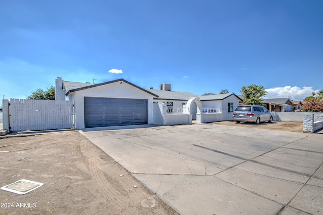 ranch-style home with a garage