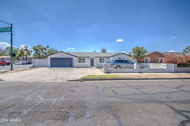 single story home featuring a garage