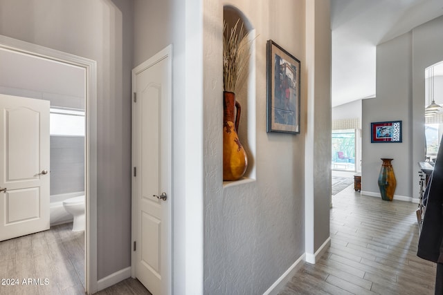 corridor featuring light hardwood / wood-style flooring