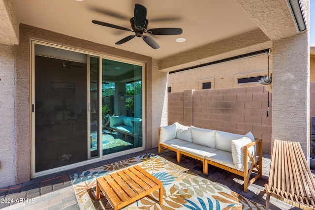 view of patio featuring ceiling fan