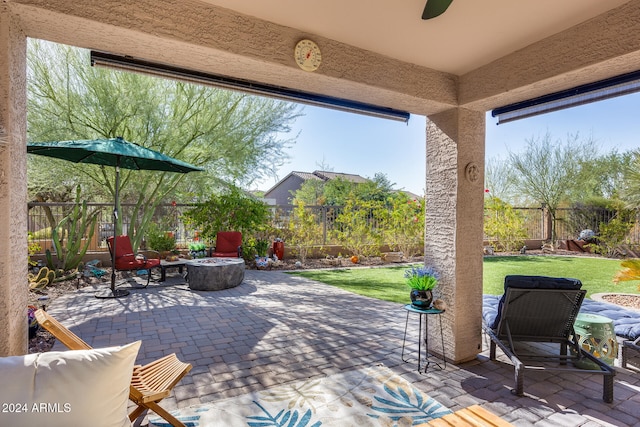 view of patio featuring an outdoor fire pit