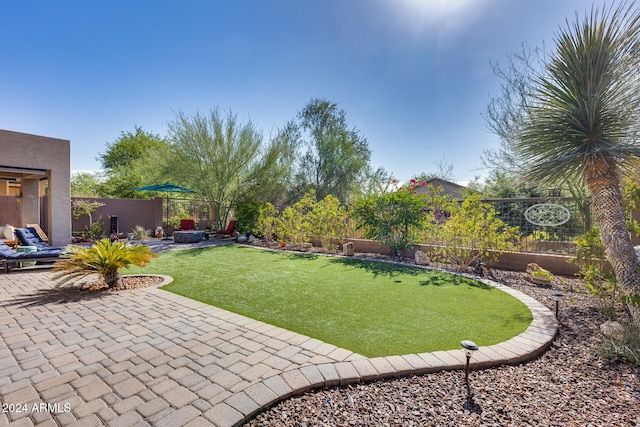 view of yard with a patio area