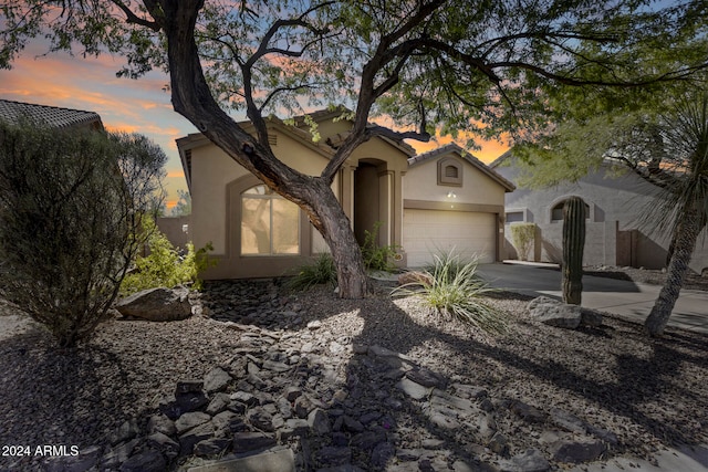 view of front of house with a garage