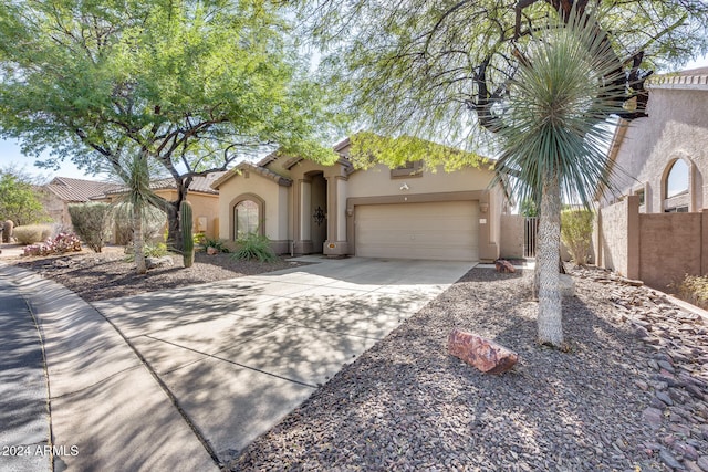 view of front of property with a garage