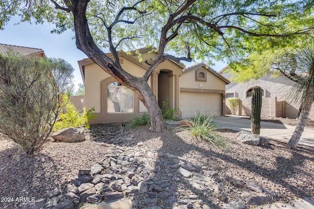 ranch-style home with a garage