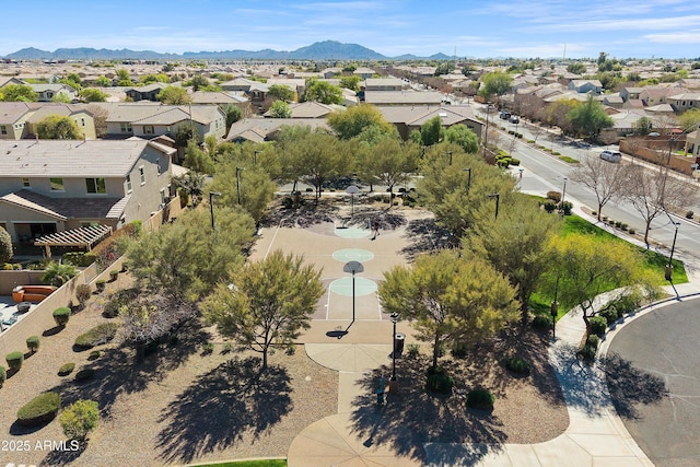 drone / aerial view with a mountain view and a residential view