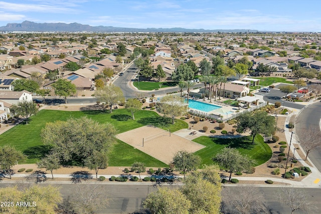 drone / aerial view featuring a residential view and a mountain view