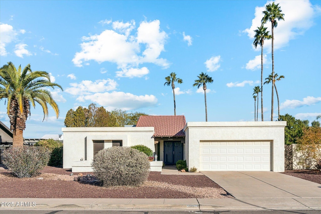 view of front of home with a garage